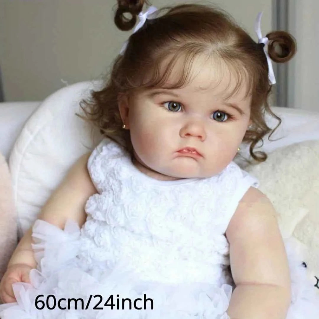 24-Inch Lifelike Reborn Baby Doll – Realistic 3D Painted Skin with Soft Vinyl Limbs in a White Dress