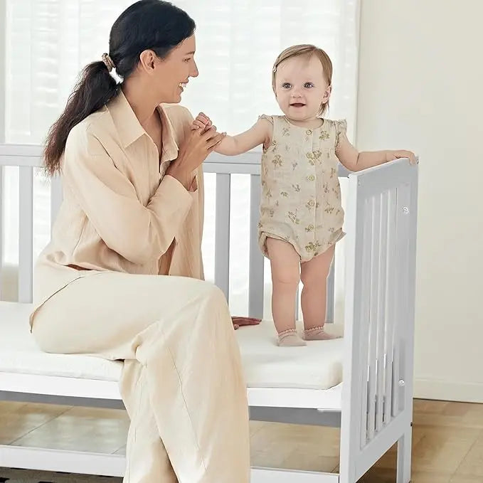 EvoNest 6-in-1 Portable Mini Crib with Mattress – White New Zealand Pinewood, 4 Height Adjustable