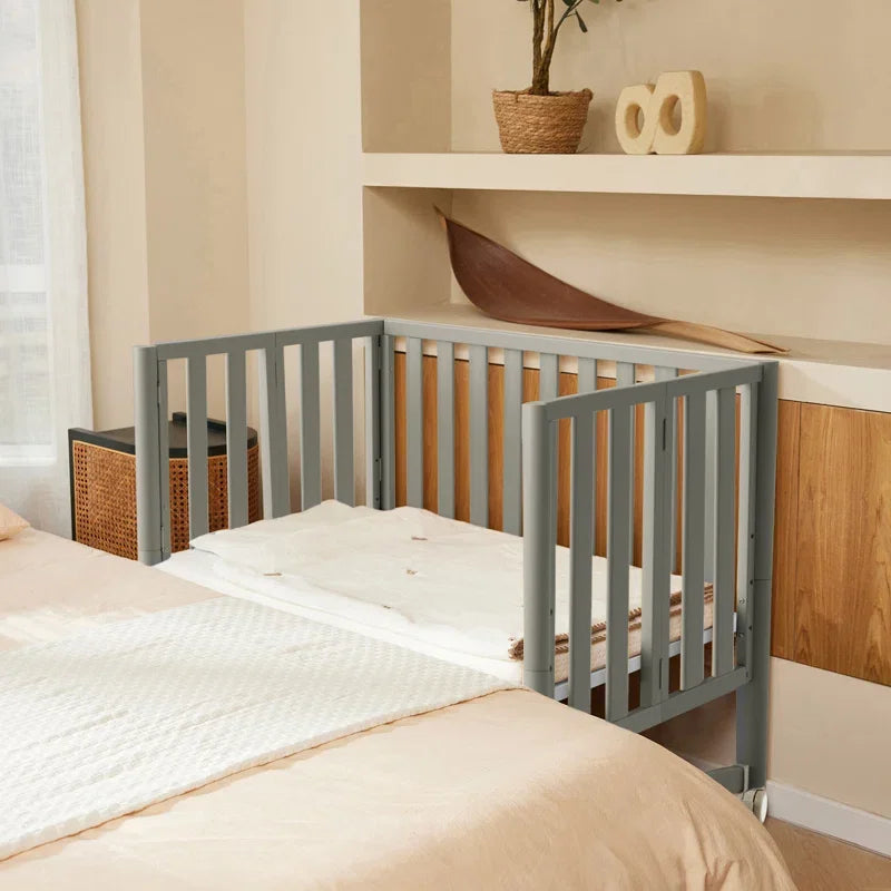6-in-1 Convertible Mini Crib with Wheels – Foldable, Adjustable Height, Portable Baby Crib (Grey, New Zealand Pine)
