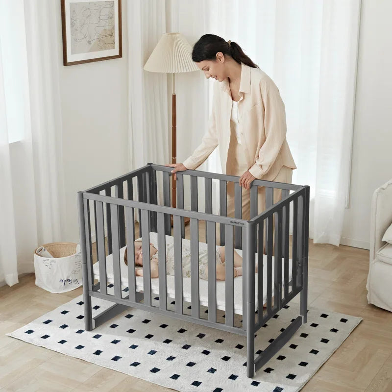 6-in-1 Convertible Mini Crib with Wheels – Foldable, Adjustable Height, Portable Baby Crib (Grey, New Zealand Pine)